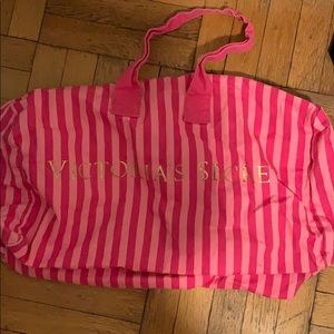 Victoria’s Secret pink striped duffel bag